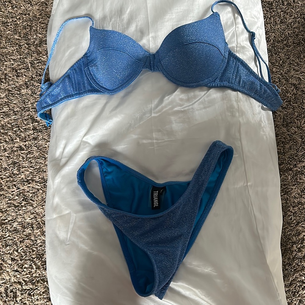 A blue sparkly triangl bathing suit! Size XS… perfect amount of sparkle